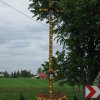 Krzyż z figurką Matki Boskiej znajdujący się w Podlesiu obok dawnej mleczarni